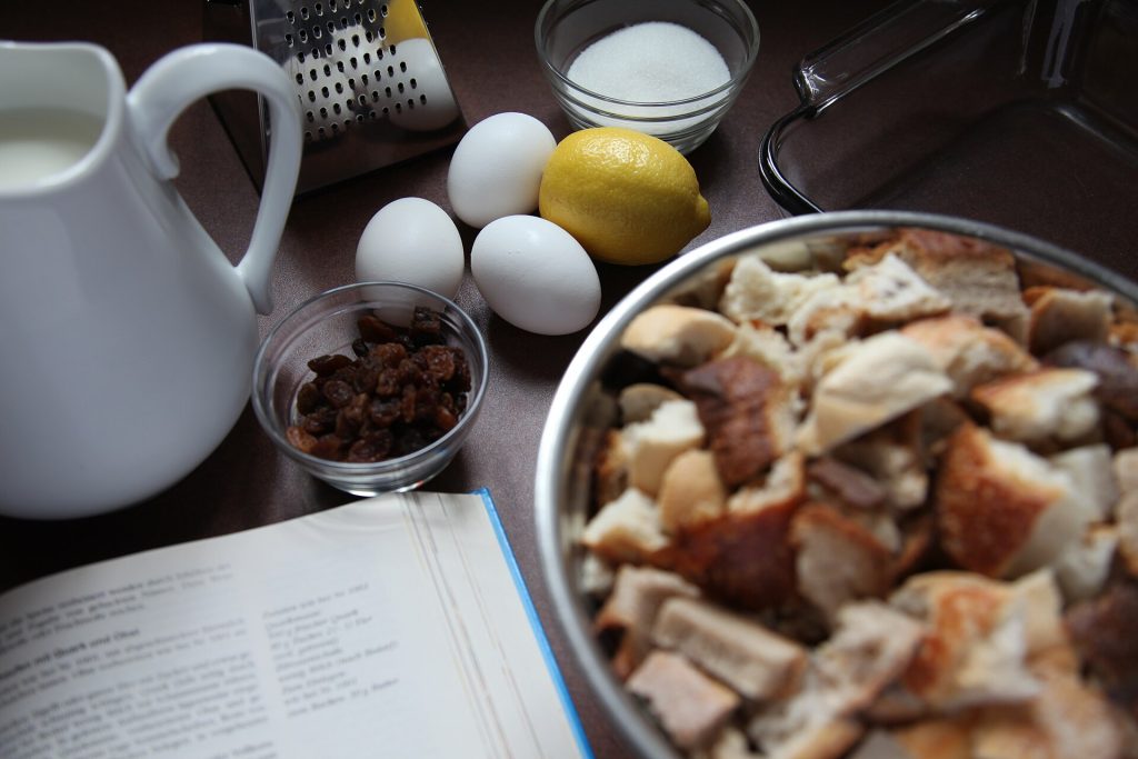 Holiday baking ingredients laid out on a wooden table