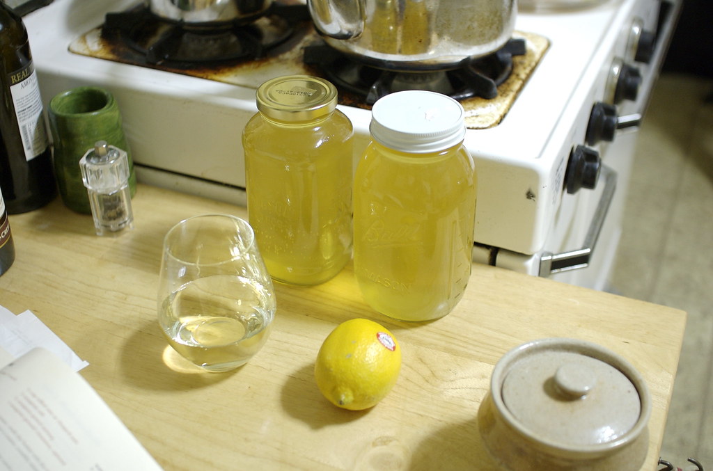 Several bottles of cider lined up for a tasting