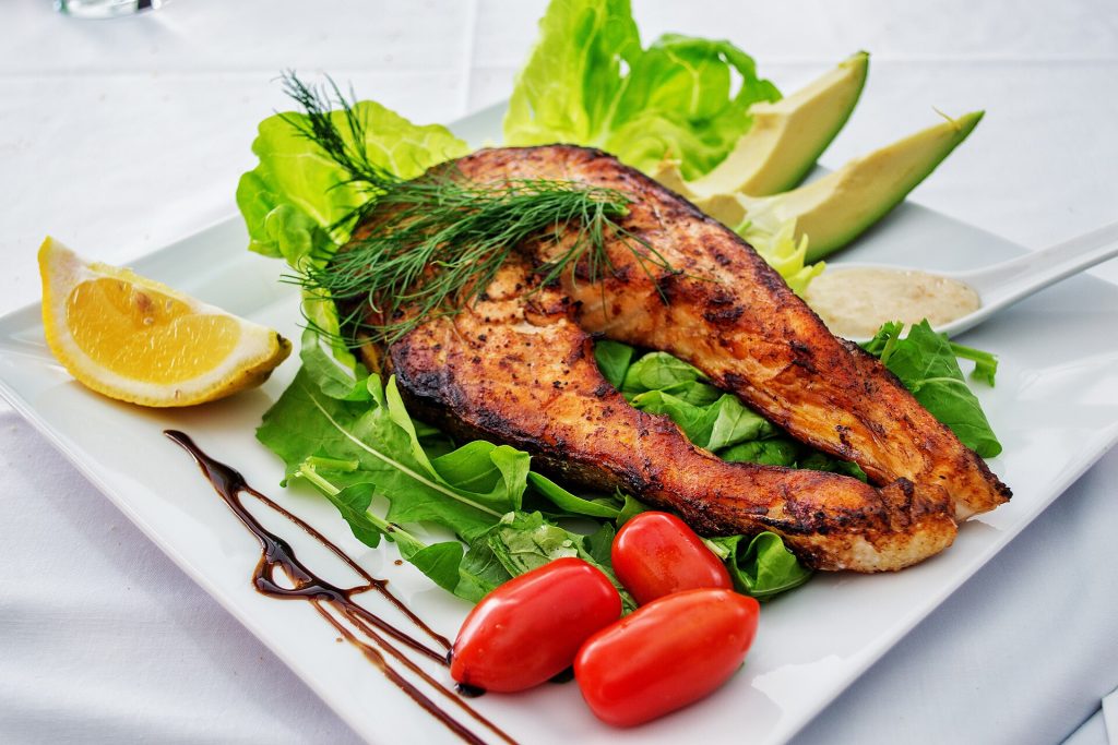 A grilled salmon fillet on a plate