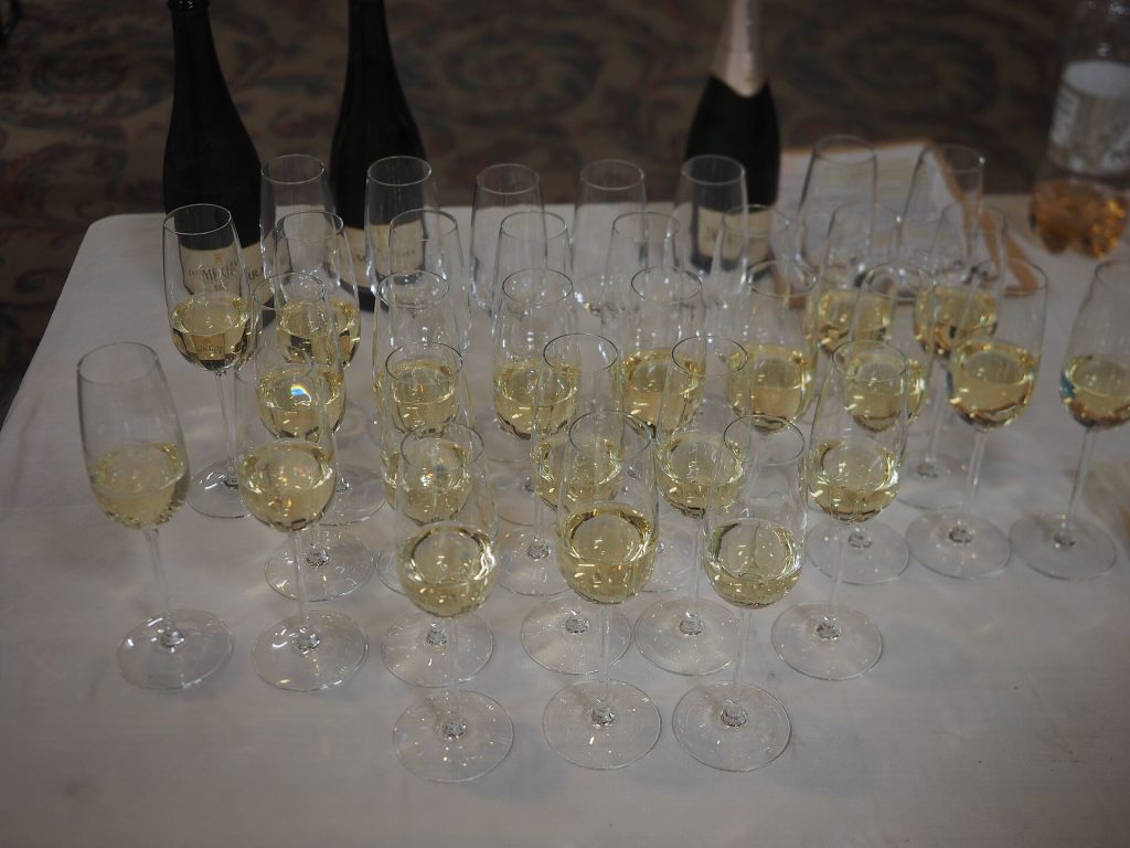 Glasses of sparkling wine on a table