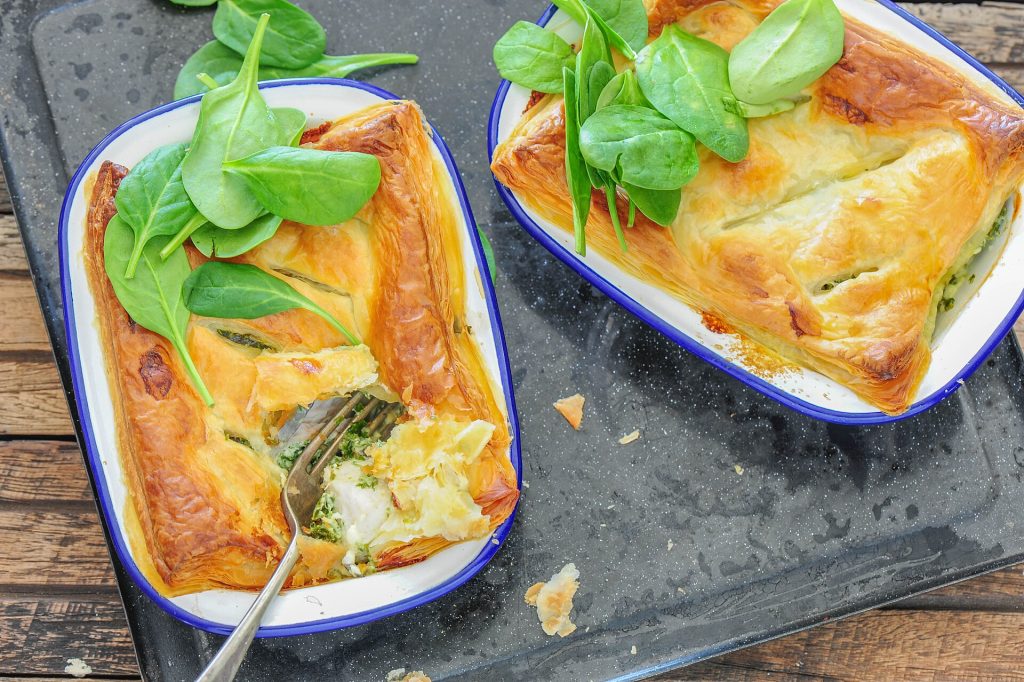 A golden turkey pot pie in a baking dish