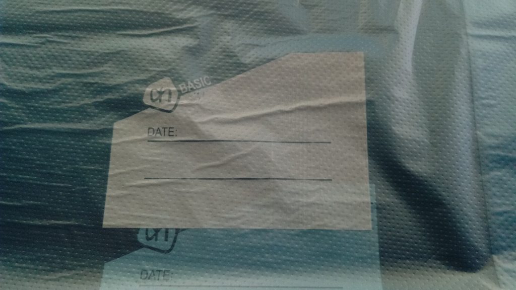 Labeled freezer bag of food